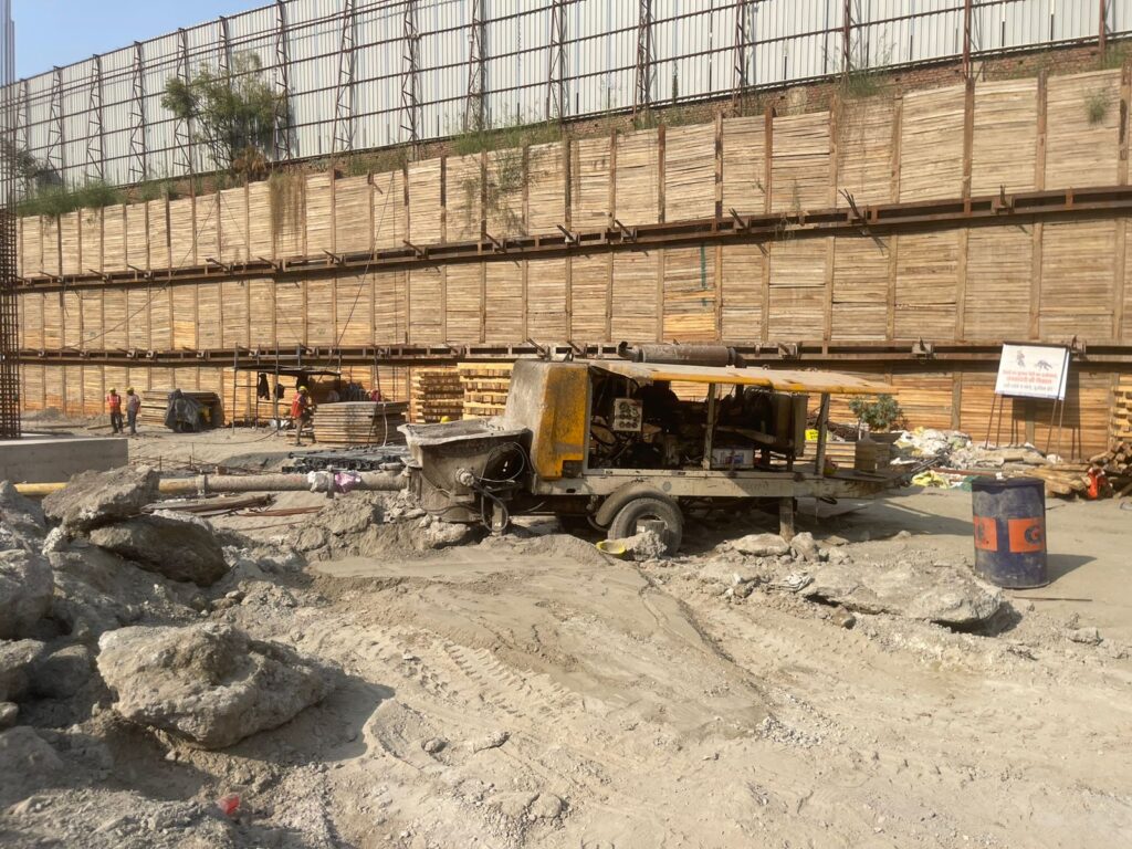 Concrete pumping pipeline at Exotica One 32 Noida